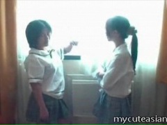 Korean Nudes presents: Amateur asian schoolgirls kiss tits in hotel room